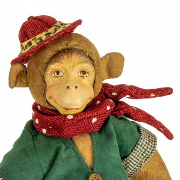 C 10400 Goodwill Animal Collectible Dolls Jungle Inspection Monkey Doll Red Green Brown Closeup
